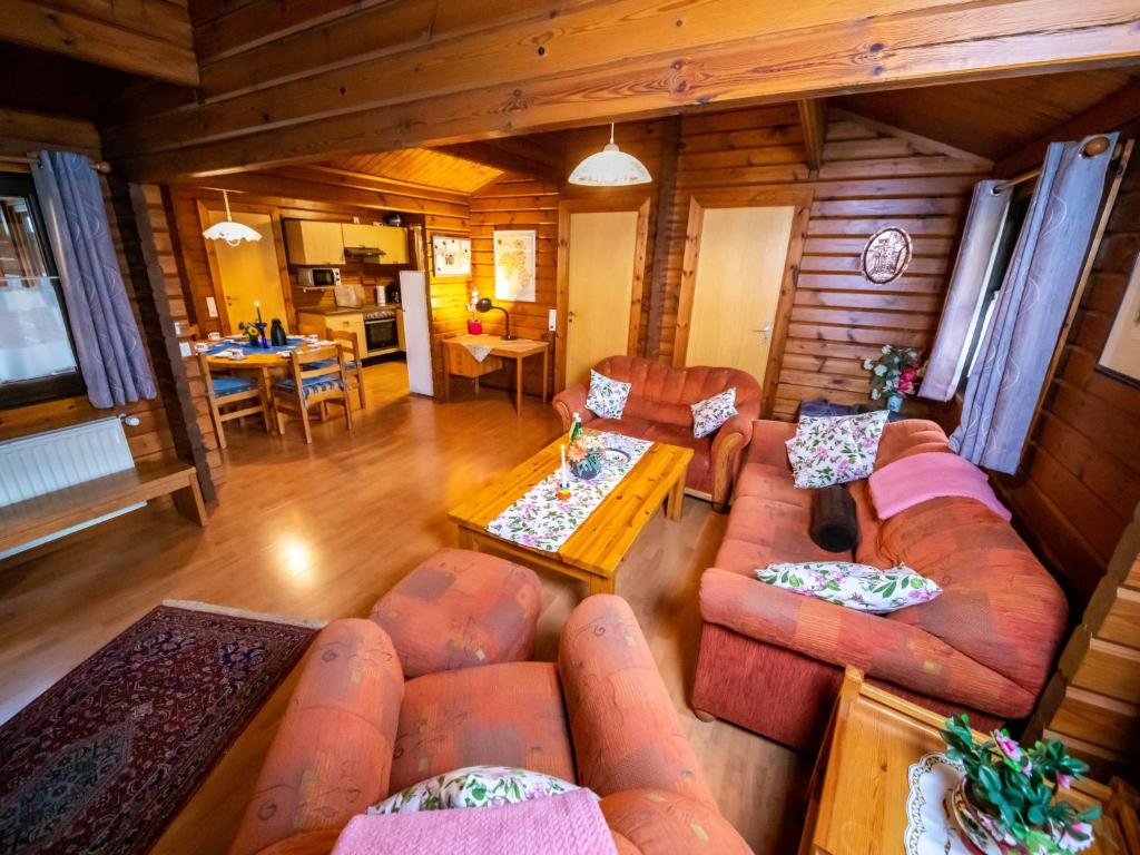 Posezení v ubytování Chalet Haus 57 Wald Eck by Interhome