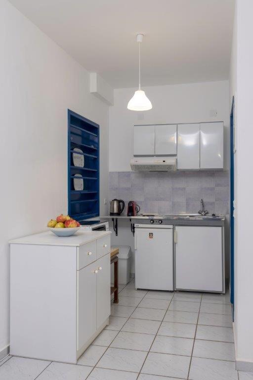 Kuchyň nebo kuchyňský kout v ubytování Sea View Studios