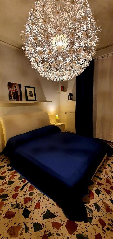 A bed or beds in a room at Casa Al Castello