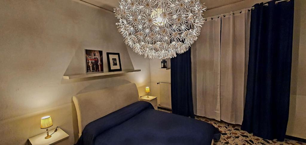 A bed or beds in a room at Casa Al Castello