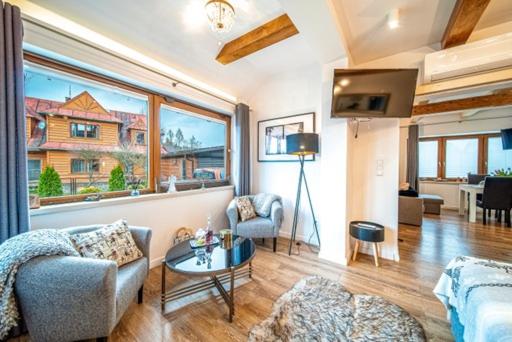 Posedenie v ubytovaní Apartament Kamieniec