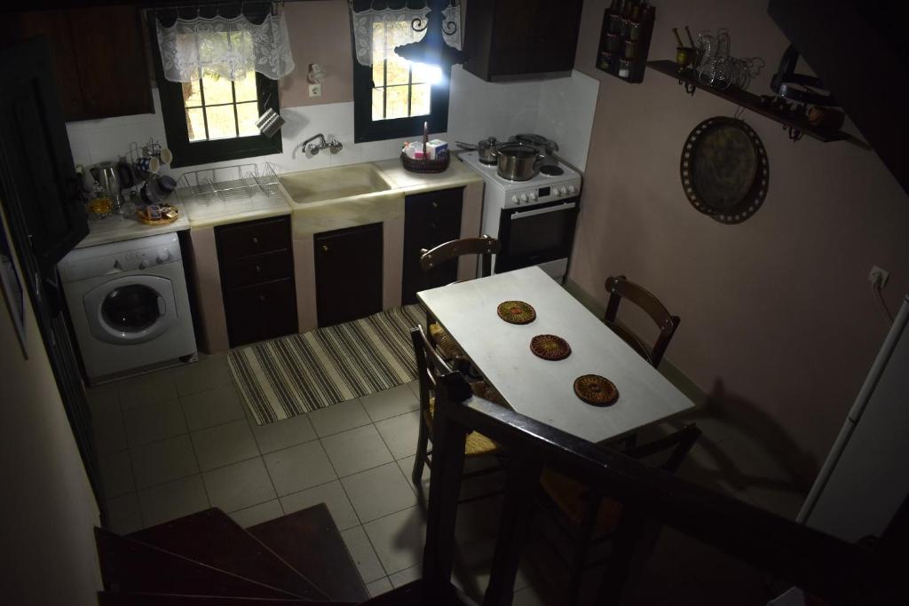 Kuchyň nebo kuchyňský kout v ubytování Anemos Holiday Houses - Unterkunft in Südkreta