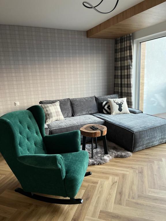 Posezení v ubytování Apartament Kamienna 28 z prywatną sauną