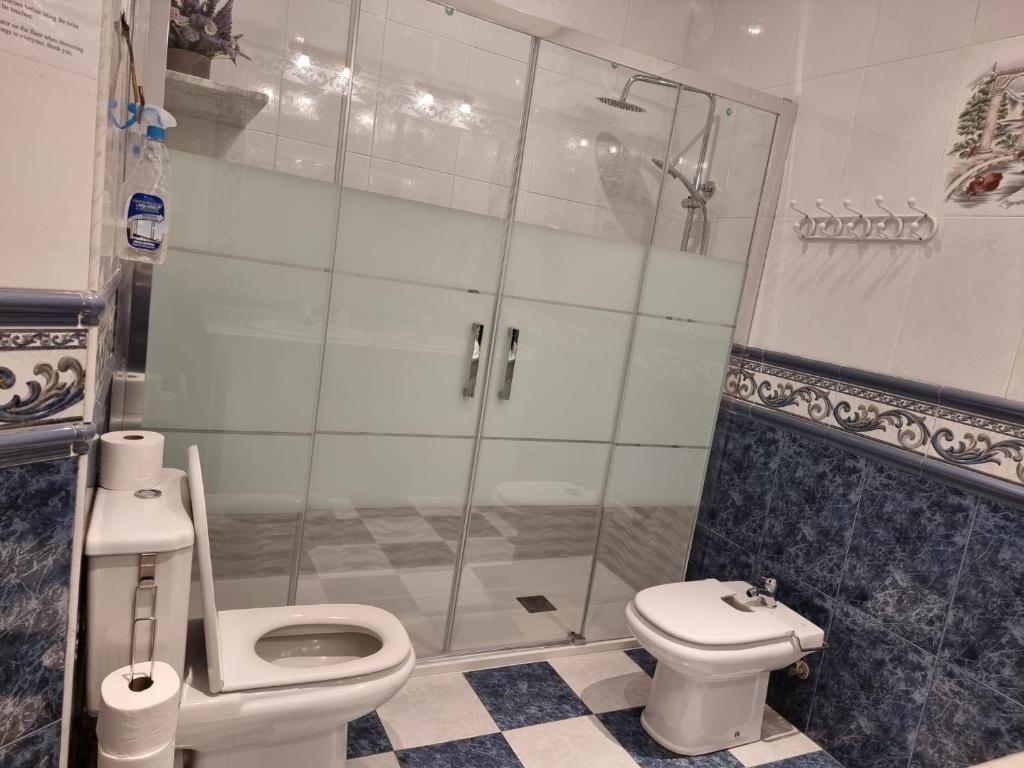 Un baño de Casa de Huéspedes Cuenca