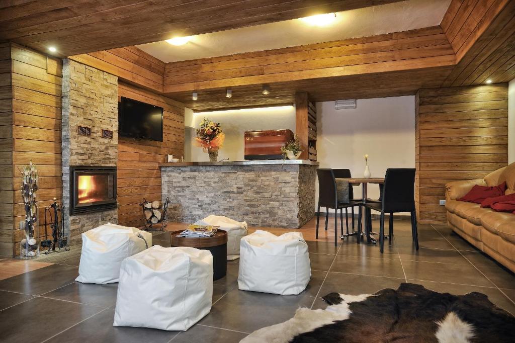 TV a/nebo společenská místnost v ubytování Piccolo Hotel Aurora