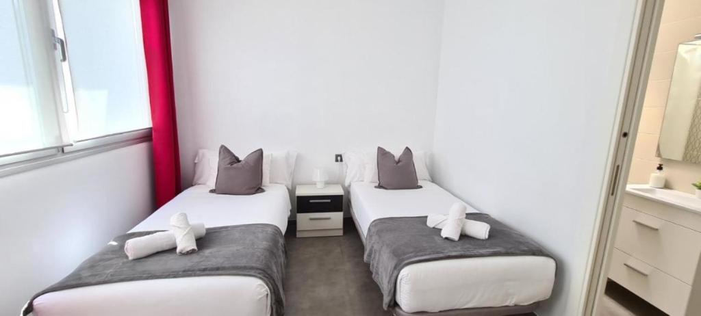 Posteľ alebo postele v izbe v ubytovaní Apartment La Cruz 8 SilHouse
