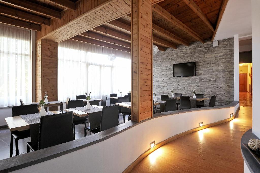 TV a/nebo společenská místnost v ubytování Piccolo Hotel Aurora