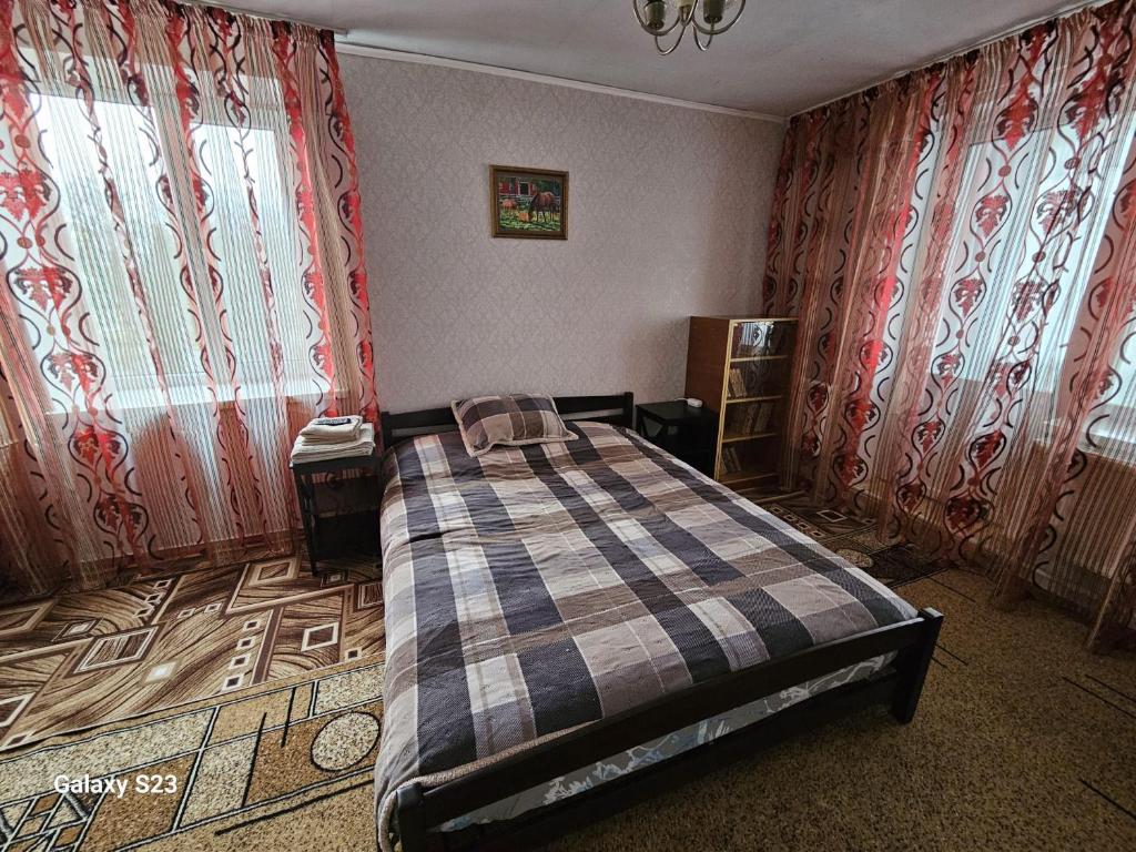 Кровать или кровати в номере Retro apartament