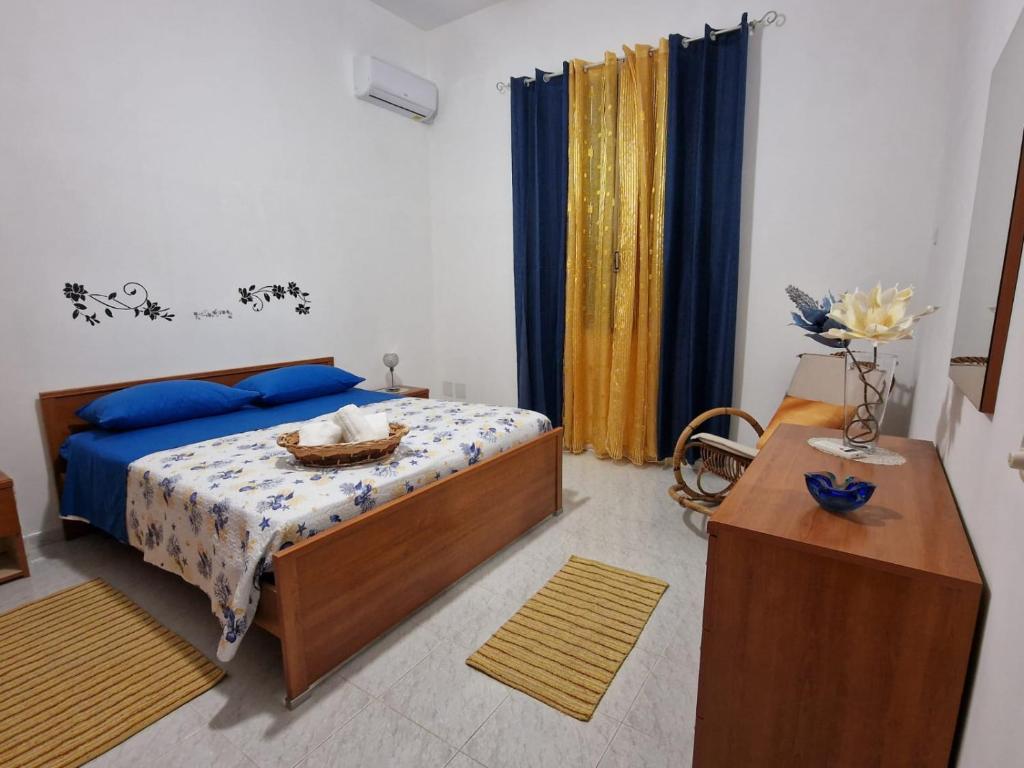 Letto o letti in una camera di Al Manzil