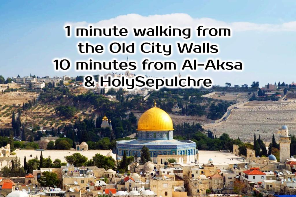 a view of the old city walls minutes from aleppo andhovsycot at New Metropole Hotel - Jerusalem in Jerusalem