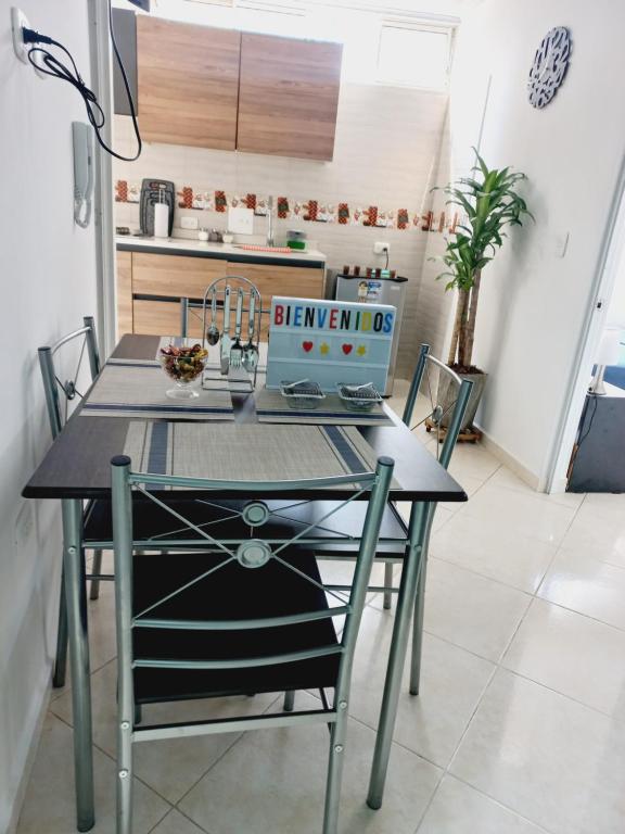 a kitchen with a table with a machine on it at Apartamento en real de minas in Bucaramanga