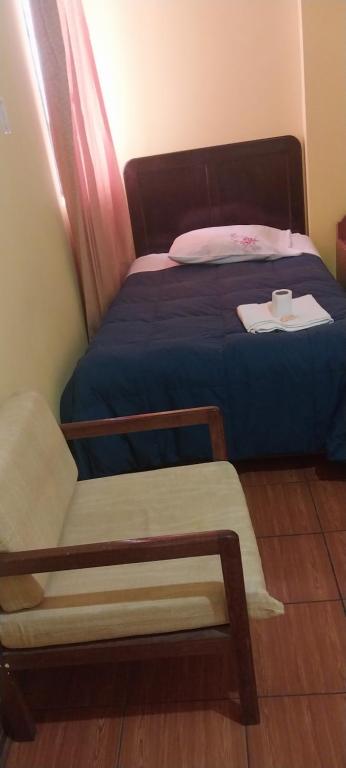 Postel nebo postele na pokoji v ubytování HOSTAL JOYA ANDINA