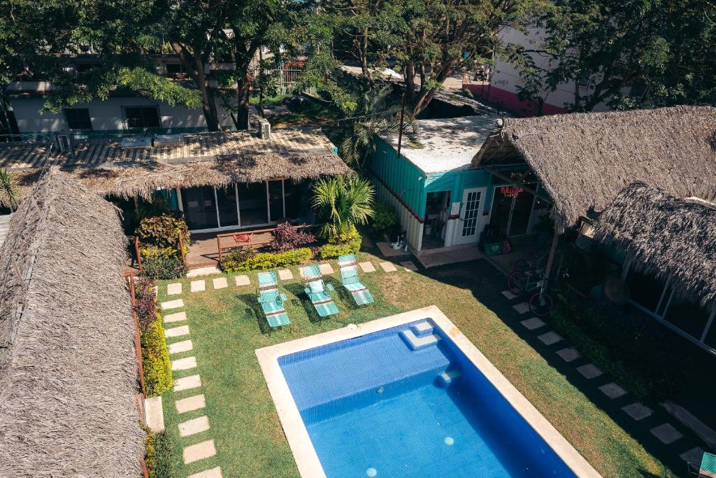 an aerial view of a house with a swimming pool at Nuiya Hoteles Centro in Sayulita