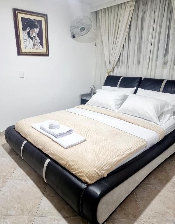 Postel nebo postele na pokoji v ubytování Hermosa casa en Bucaramanga