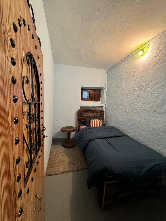 Postel nebo postele na pokoji v ubytování Gîte de montagne Azilane