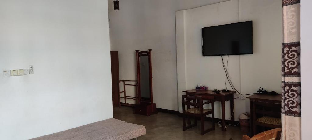 TV a/nebo společenská místnost v ubytování Trellis Homes