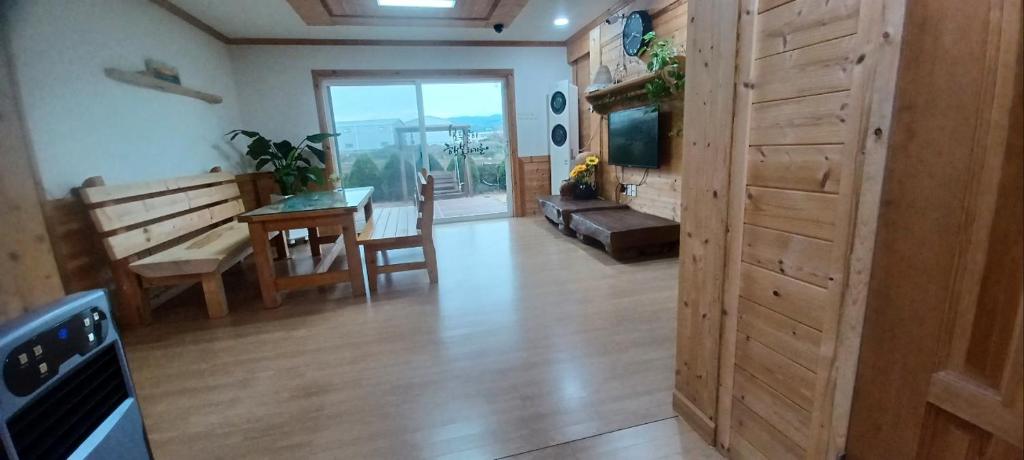 Posezení v ubytování Tree House Guesthouse