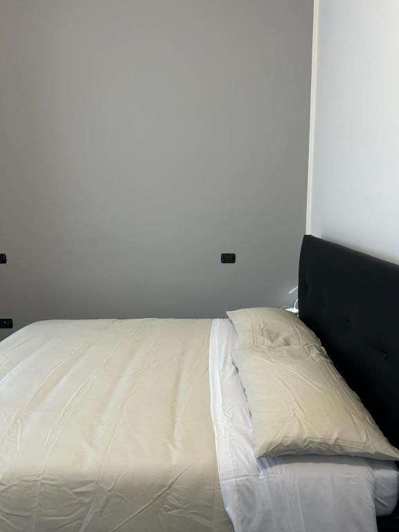 Postel nebo postele na pokoji v ubytování Caprotti 6