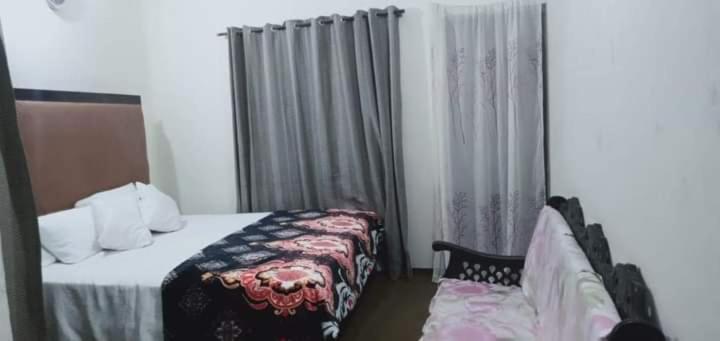 Family Guest House Lahore Near Airport - Habitación Doble Presupuestar