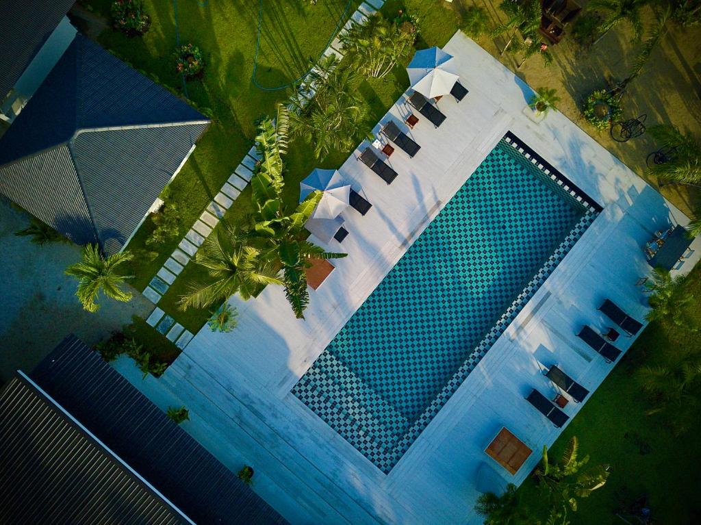 an overhead view of a large swimming pool at Moorea Boutique Resort Samui in Koh Samui 