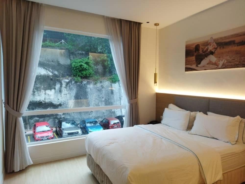 Postel nebo postele na pokoji v ubytování AP Concept Hotel