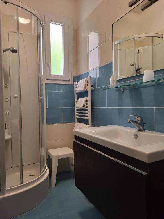Koupelna v ubytování Hotel Mondial