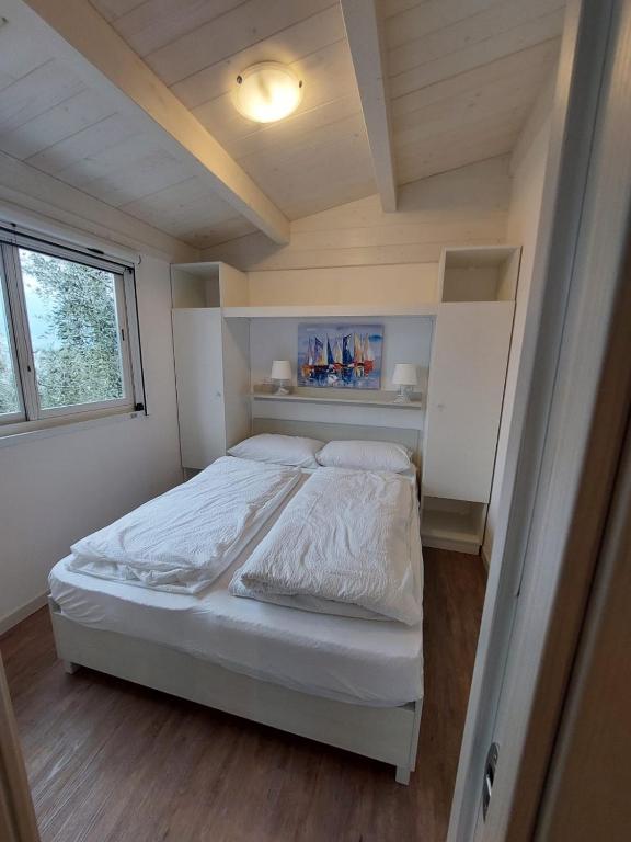 Postel nebo postele na pokoji v ubytování Camping Le Maior