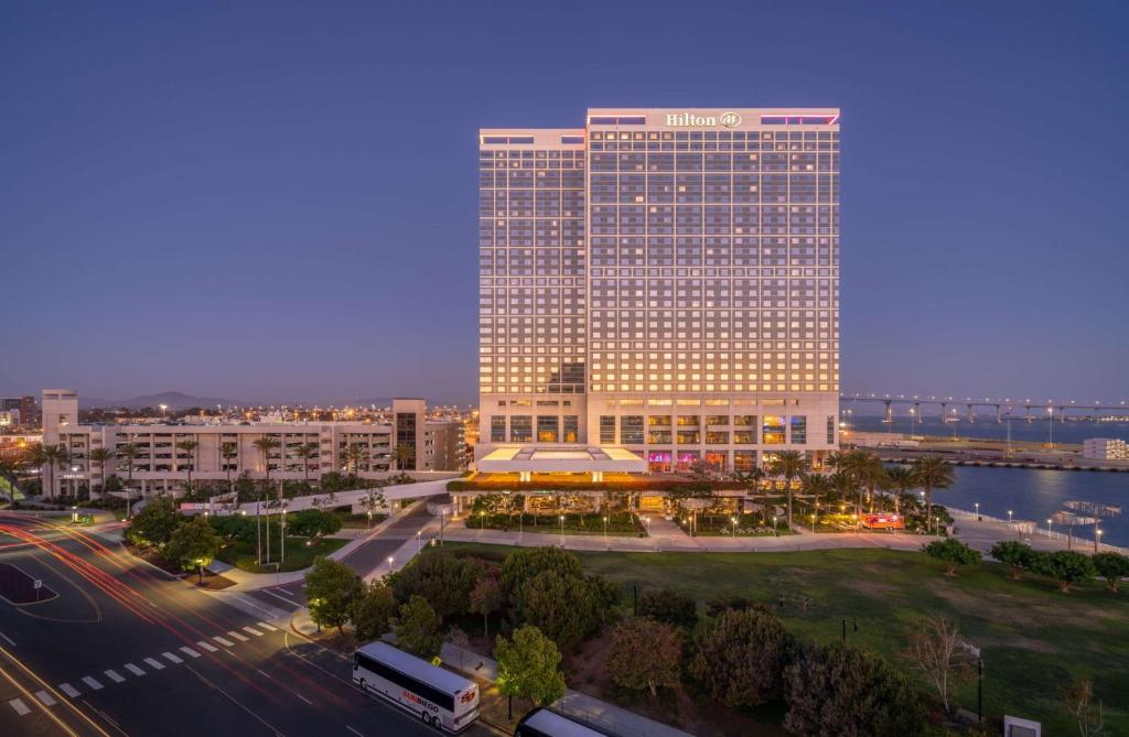 a large building in a city with a street at Hilton San Diego Bayfront in San Diego