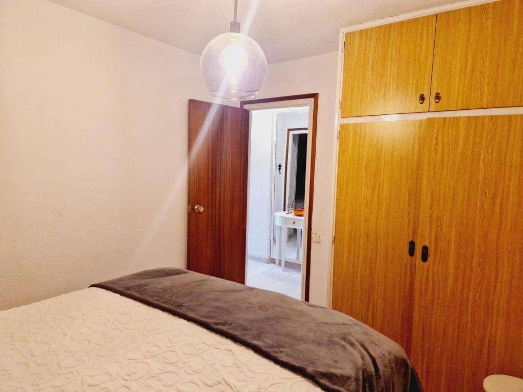 Postel nebo postele na pokoji v ubytování Villaservice - Torresol