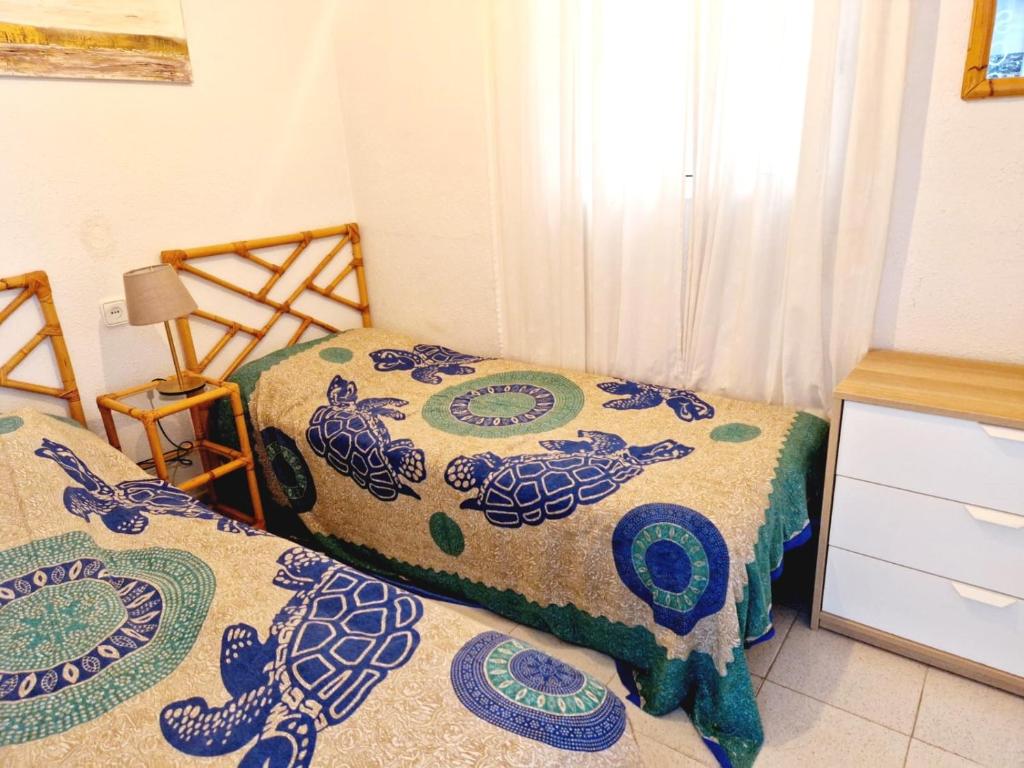 Postel nebo postele na pokoji v ubytování Villaservice - Torresol