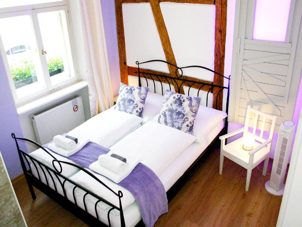 Postel nebo postele na pokoji v ubytování Boutique Hotel Little Venezia