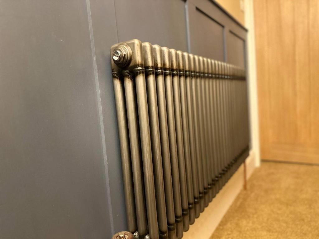 a radiator on the side of a wall at Harbour Heights Whitby in Whitby