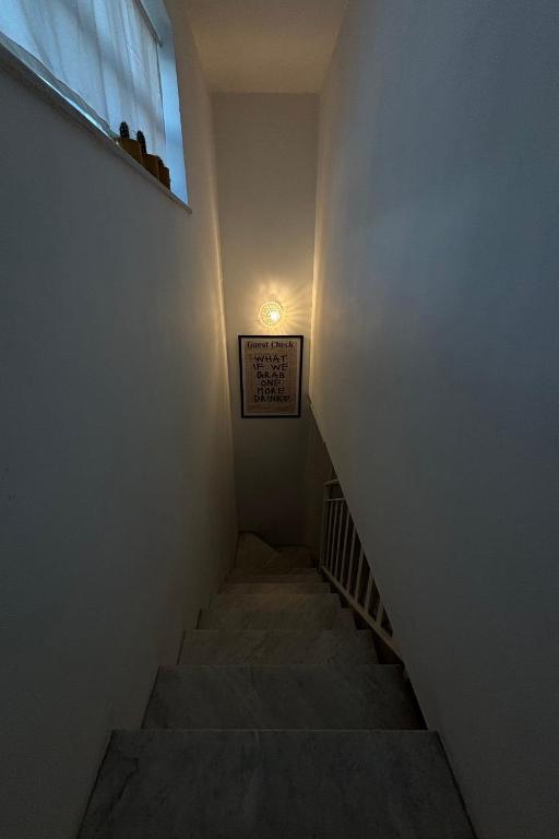 Posteľ alebo postele v izbe v ubytovaní HOMESTAY rooftop