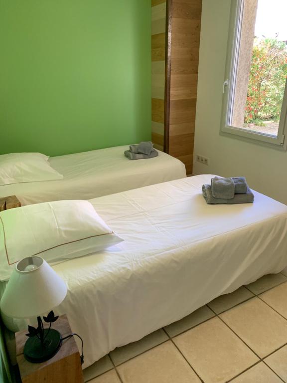 Postel nebo postele na pokoji v ubytování PURAVIDA APPART's