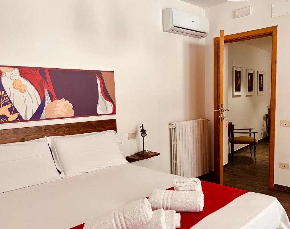 Postel nebo postele na pokoji v ubytování Carrales Guest House