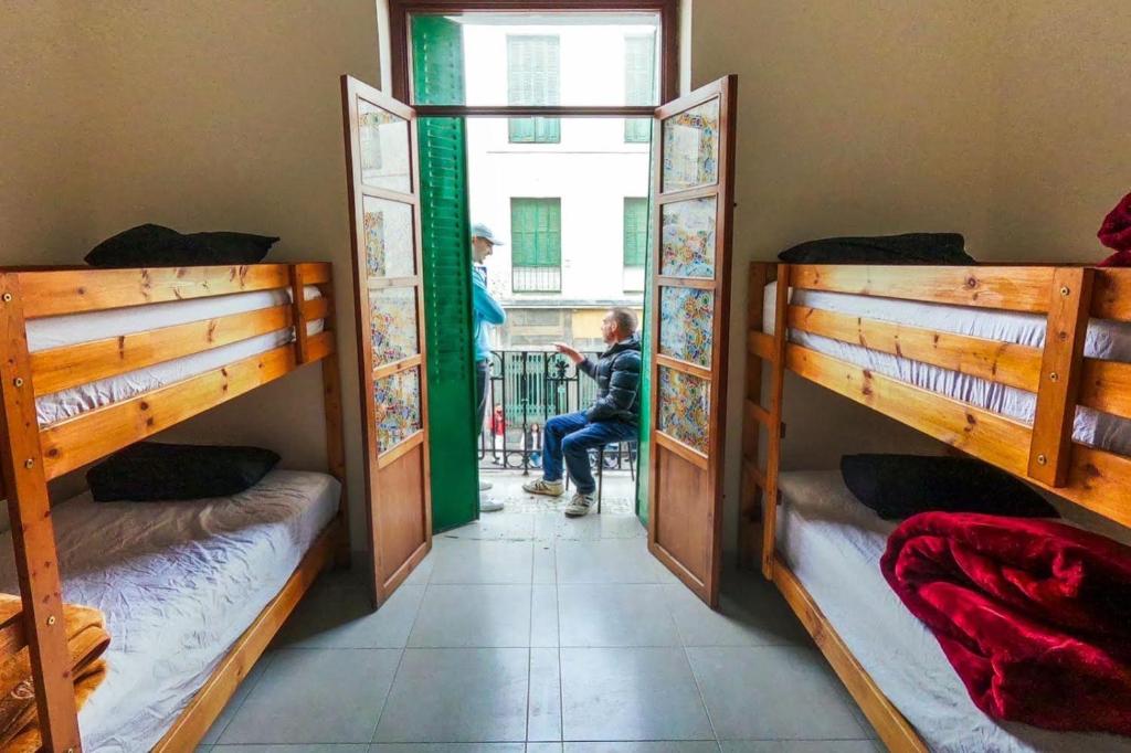 Letto o letti in una camera di MARHABA INN by HB Hostels