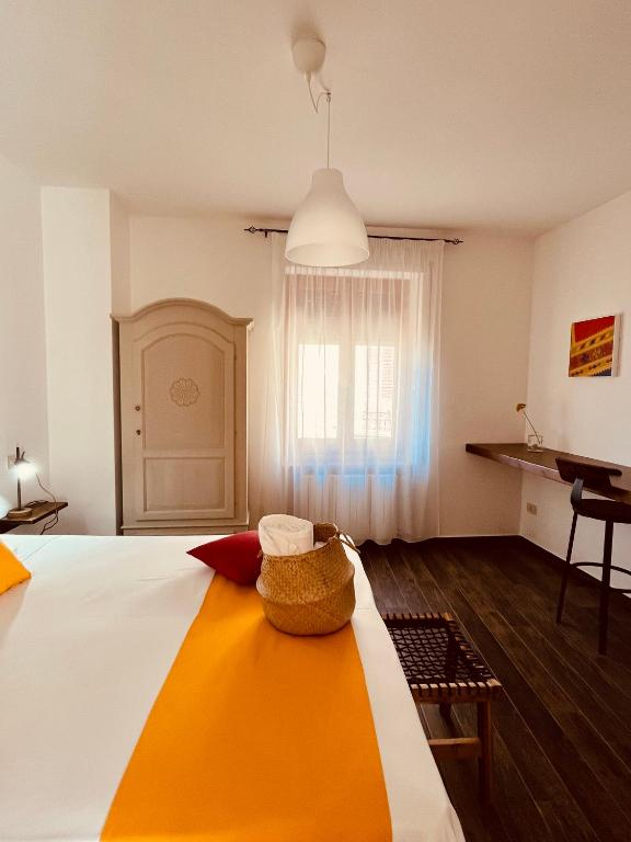 Postel nebo postele na pokoji v ubytování Carrales Guest House