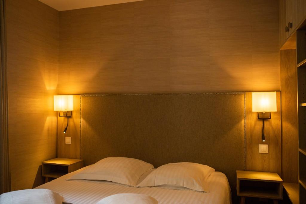Posteľ alebo postele v izbe v ubytovaní Relais de la Loire