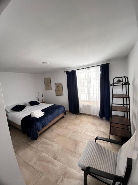 Postel nebo postele na pokoji v ubytování Shanti’s Andalusian Rooms