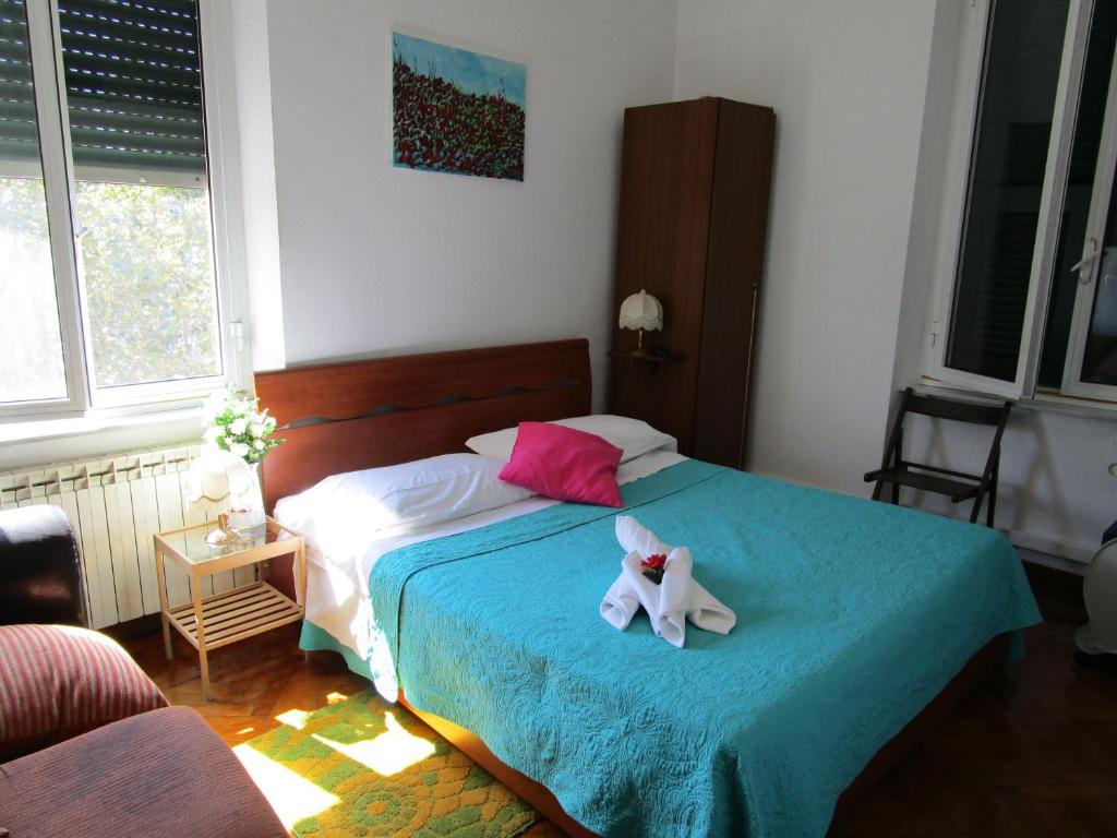 Postel nebo postele na pokoji v ubytování Hotel Guesthouse MASSENA