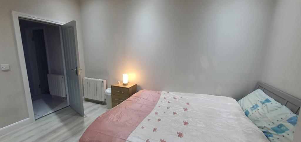 Postel nebo postele na pokoji v ubytování Studio with Private Kitchen
