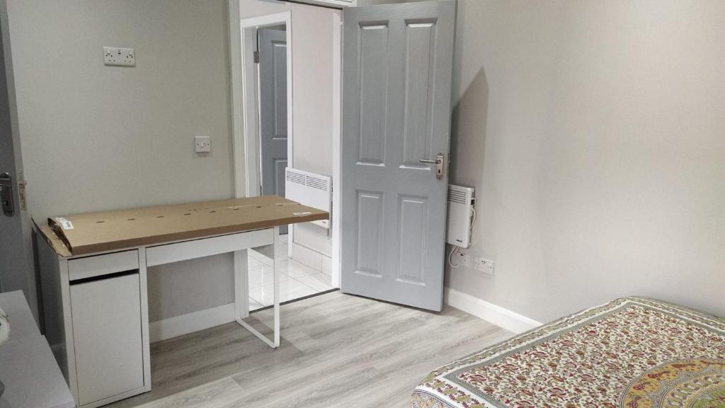 Postel nebo postele na pokoji v ubytování Studio with Private Kitchen