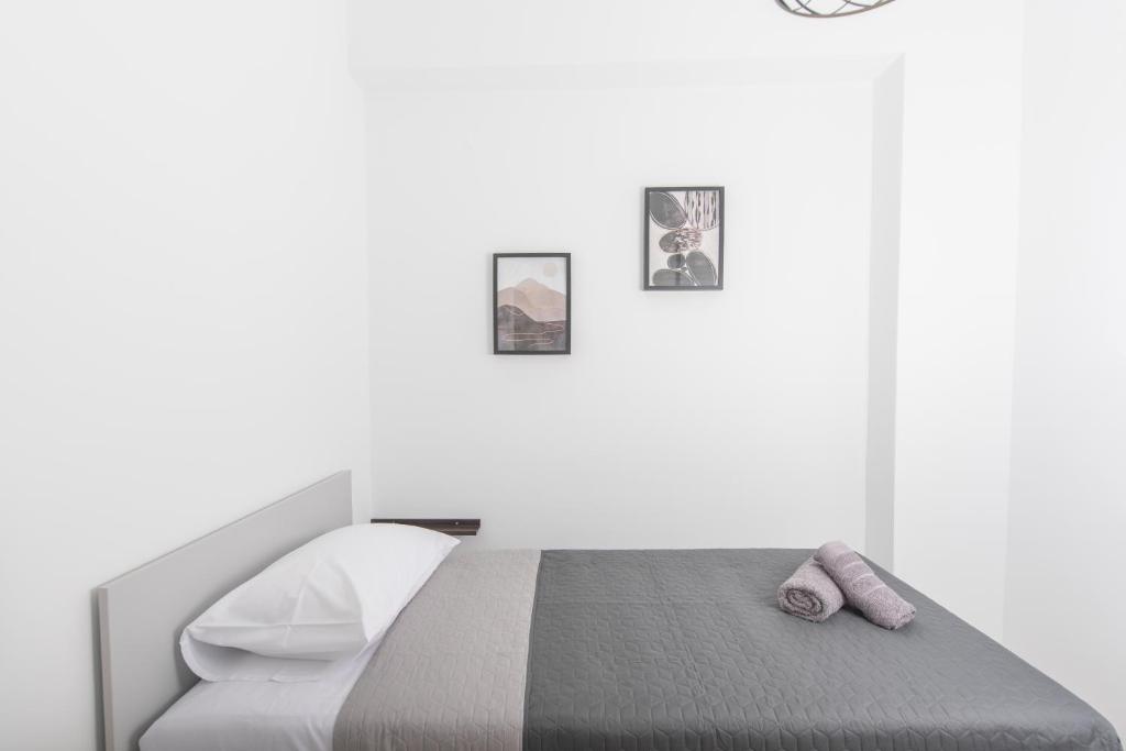 Postel nebo postele na pokoji v ubytování Casa di Hari