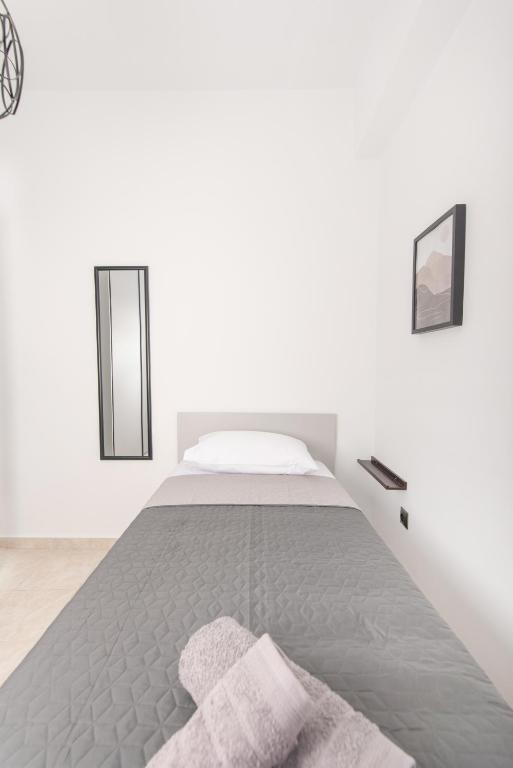 Postel nebo postele na pokoji v ubytování Casa di Hari