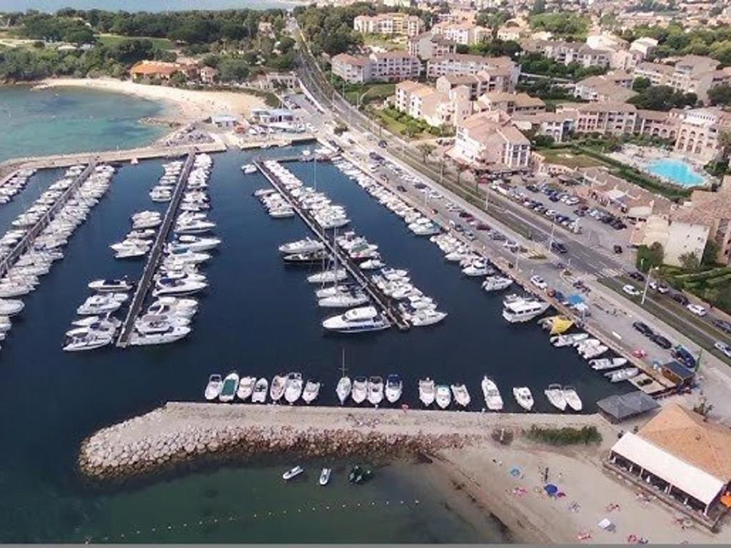 an aerial view of a marina with boats in the water at Appartement Six-Fours-les-Plages, 2 pièces, 5 personnes - FR-1-316-118 in Six-Fours-les-Plages