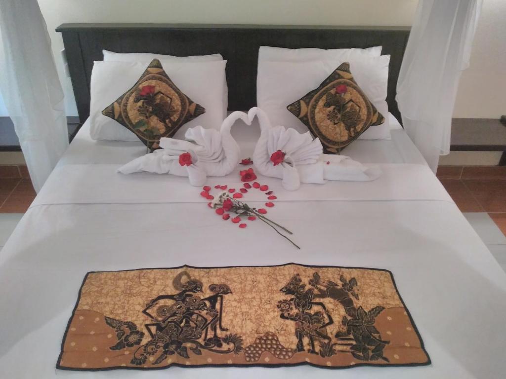 Postel nebo postele na pokoji v ubytování Ode Resto Guesthouse