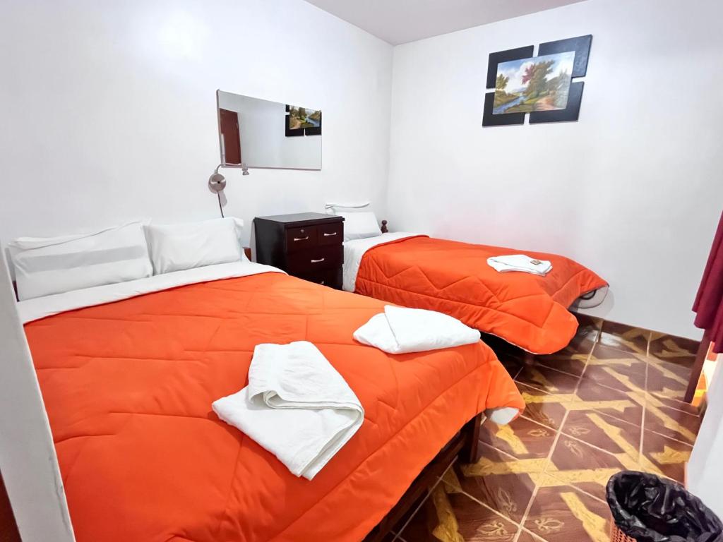 Postel nebo postele na pokoji v ubytování Sunrise Guest House