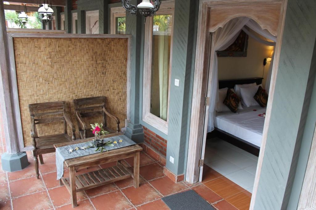 Postel nebo postele na pokoji v ubytování Ode Resto Guesthouse