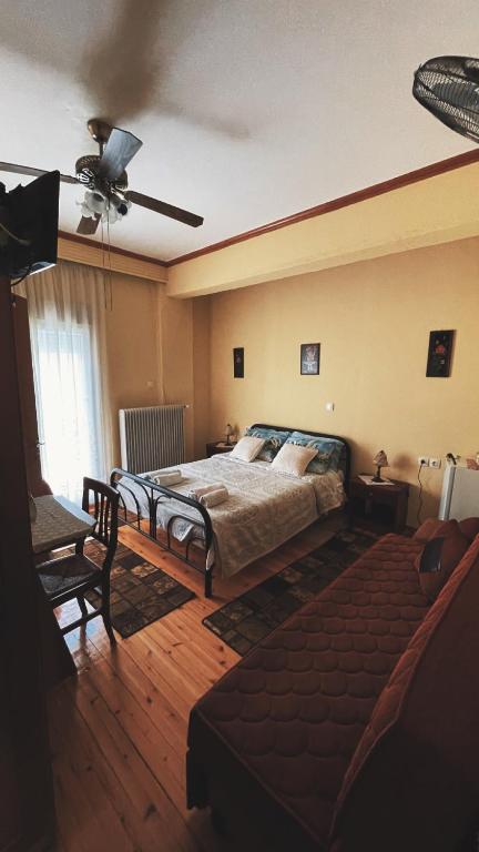 Postel nebo postele na pokoji v ubytování Olympiades Rooms Litóchoro