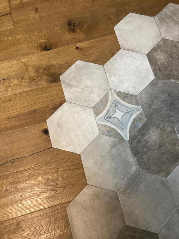 an overhead view of a hexagonal tile floor at Appartamento anche solo pomeriggio in Reggio di Calabria